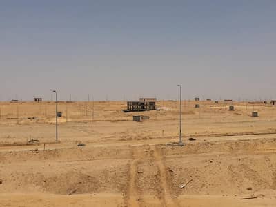 Residential Land for Sale in New Cairo, Cairo - قطعه ارض علي شارع رىيسي امام بالم هيلز نيو كايرو وجهه بحري