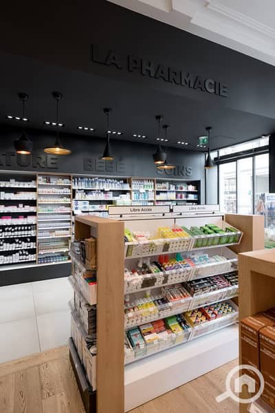 محلات تجارية  للبيع في الشيخ زايد، الجيزة - AUTHENTICITÉ & MODERNITÉ - Agencement Pharmacie de la Barre (69). jpeg