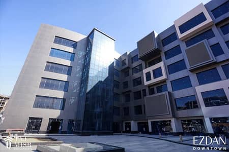 Retail for Sale in New Capital City, Cairo - استلام فوري دور أرضي محل تجاري 42م بأميز لوكيشن أمام فندق الماسة