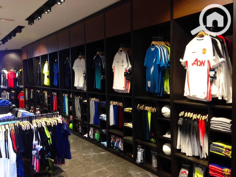 ديكورات-محلات-ملابس-4 (1). jpg ديكورات-محلات-ملابس-4 (1). jpg