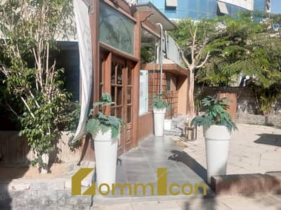 Retail for Rent in New Cairo, Cairo - Finished shop for rent, suitable for a restaurant or cafe, in Fifth Settlement