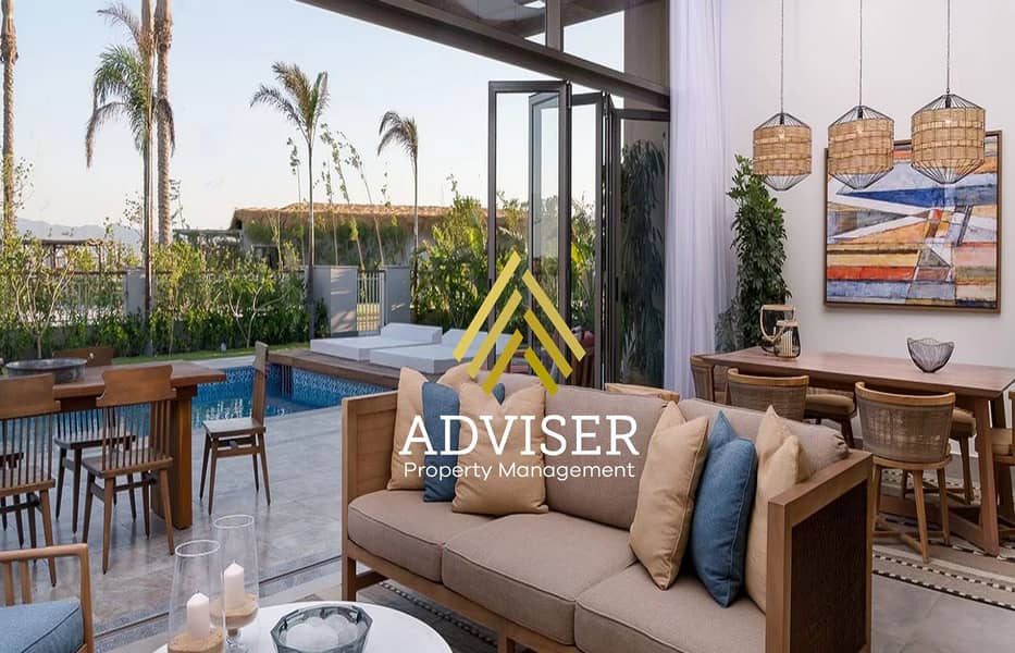 9 SHR-RasSoma-rooms-2BedroomVilla-DiningAndLivingArea-2021102016-2-fw. jpg