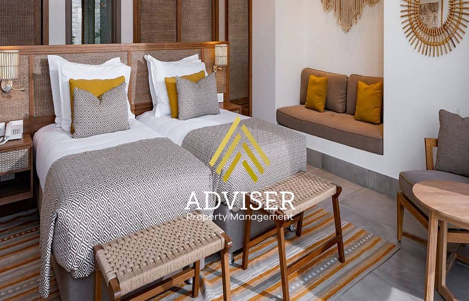 10 SHR-RasSoma-rooms-2BedroomVilla-LivingAndDiningArea-2021102016-for-web. jpg