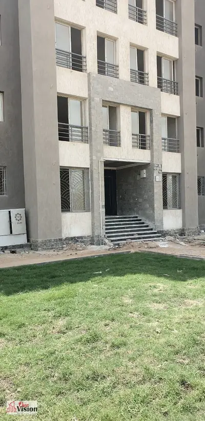 Apartment for sale in Janna Zayed 4, 115 meters, ground floor attached in front of the main gate, 2 bedrooms, 2 bathrooms, paid 15450, required 2100M, remaining 20 thousand dollars.