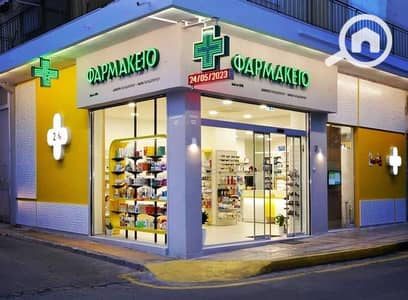 صيدليه  للبيع في الشيخ زايد، الجيزة - Yellow pharmacy exterior Greece, Kali Gavriil Design  Lab. jpeg