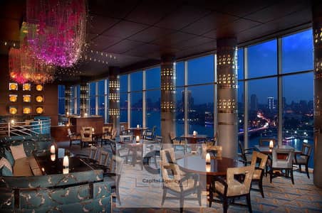 Restaurant & Cafe for Rent in New Cairo, Cairo - a-rooftop-lounge-with. jpg Restaurant & Cafe for Rent in New Cairo, Cairo - a-rooftop-lounge-with. jpg