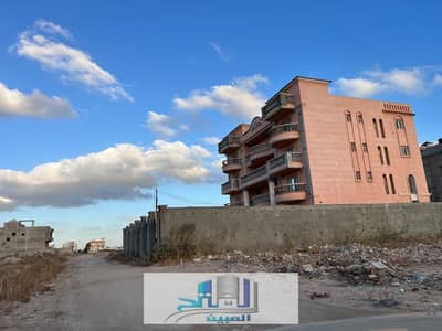 Other Commercial for Sale in Moharam Bik, Alexandria - قطعة ارض للبيع ناصية على شارع 16 و 7 متر _على الطريق الرئيسي الدائري