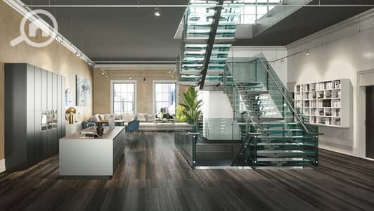 تاون هاوس 3 غرف نوم للبيع في الشيخ زايد، الجيزة - تصميم درج زجاجي يميز ديكورات الفلل الدوبلكس. jpg