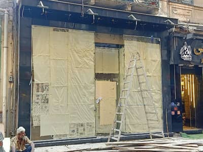 محلات تجارية  للايجار في محطة الرمل، الإسكندرية - للايجار محل في شارع الشهداء محطه الرمل اسكندريه