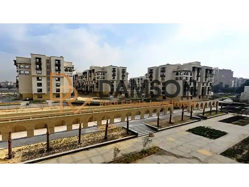 6 كمبوند-الفسطاط-سور-مجري-العيون. jpg