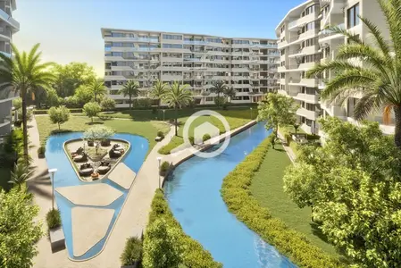 Apartment for sale in the heart of Taj City in Fifth Settlement, near Suez Road and Cairo Airport, at a very special price.