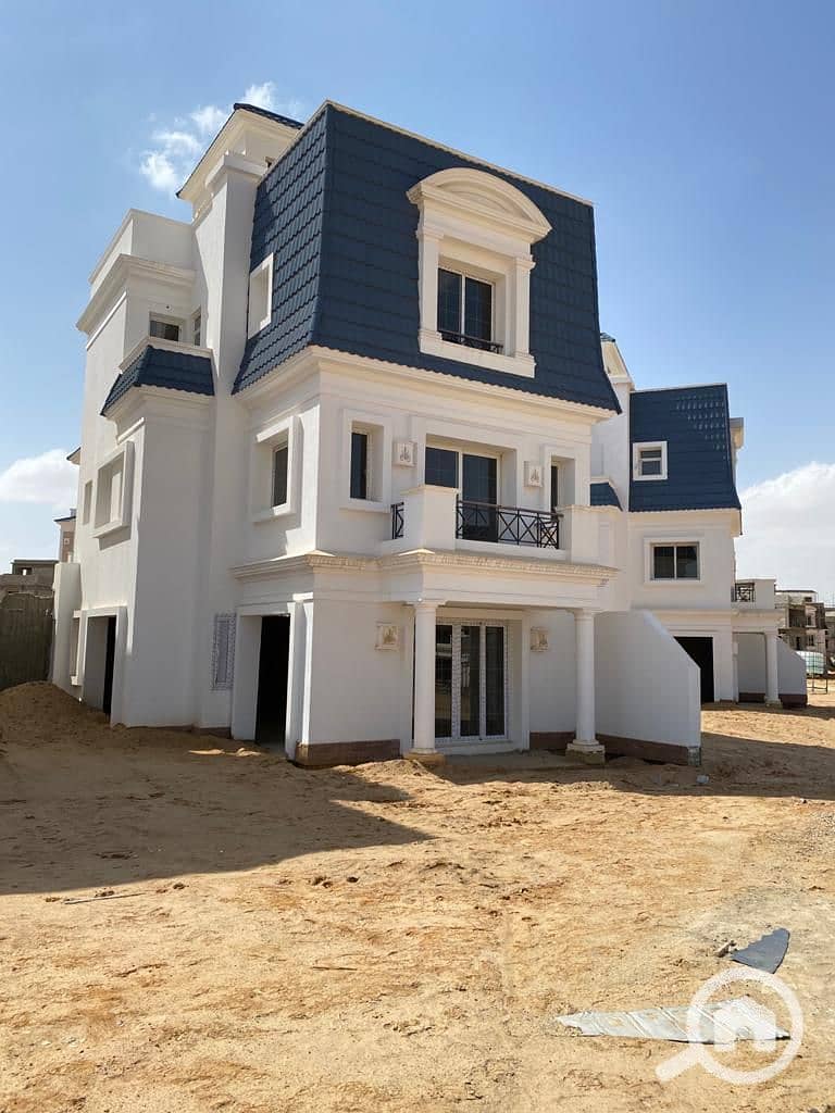 Own an independent villa with an area of 327 meters overlooking a very distinctive view in Mountain View in the northern expansions. - Aanzicht 3