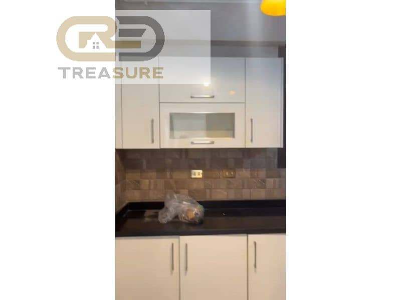 semi furnished Duplex with garden for rent in Eastown - new cairo - Więcej