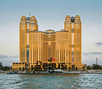 مکتب  للايجار في بولاق أبو العلا، القاهرة - Regus_Cairo, Nile City Towers_Egypt_8000_Exterior Building 1. jpg