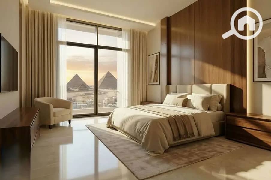 Fully Furnished & Equipped Serviced Apartment for Sale – Direct Pyramids View – Managed by Hilton – Highest Investment Return in USD – pohled 2
