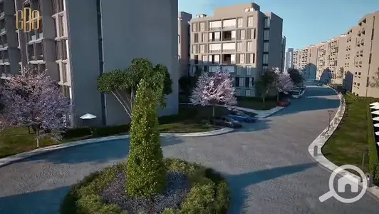 Ground floor apartment with garden, 133 sqm, down payment 638,000 EGP, and installment over 8 years in Al-Maqadam Compound.