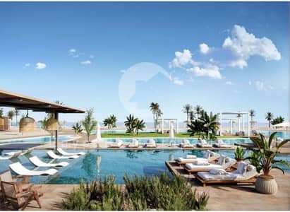 دوبلكس 3 غرف نوم للبيع في الساحل الشمالي، مطروح - facilities - -beach - -cali-coast-north-coast-maven-2jpg-1200x900. jpg