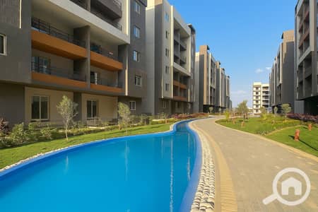 3 Bedroom Apartment for Sale in Hadayek October, Giza - 20251001_1035_مبنى مع حديقة وبركة_remix_01k6fb0qjgfwws4va2pqnxbbnw. png