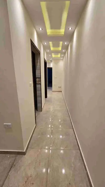 Apartment for sale, elevated ground floor in Al-Miraj Al-Sufli, area 140m + 60m garden + 15m external space