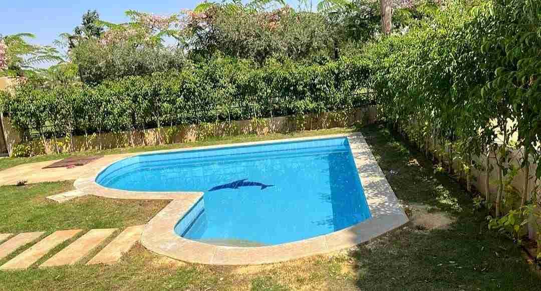 Standalone villa with a private pool at an old price, ready for immediate delivery in New Cairo – North Investors area, close to Waterway and Al Rehab City. - Mehr