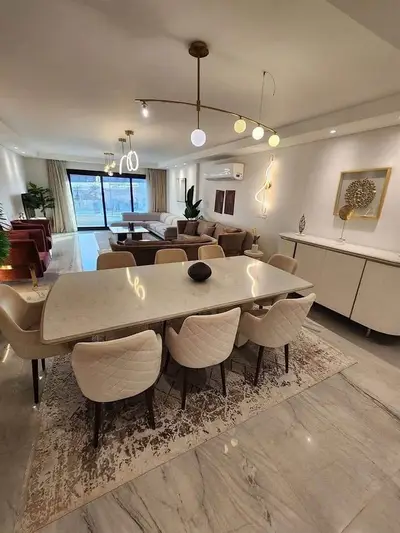 Garden apartment available for viewing and immediate delivery, fully finished with hotel-style finishing in Sheraton El Mataar