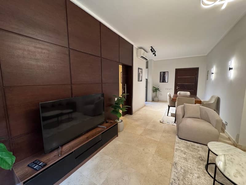 Apartment fully furnished First USE for rent in Compound The Village by Palm Hills. Located in front of AUC and point 90 mall. near to all facilities. - Widok 2