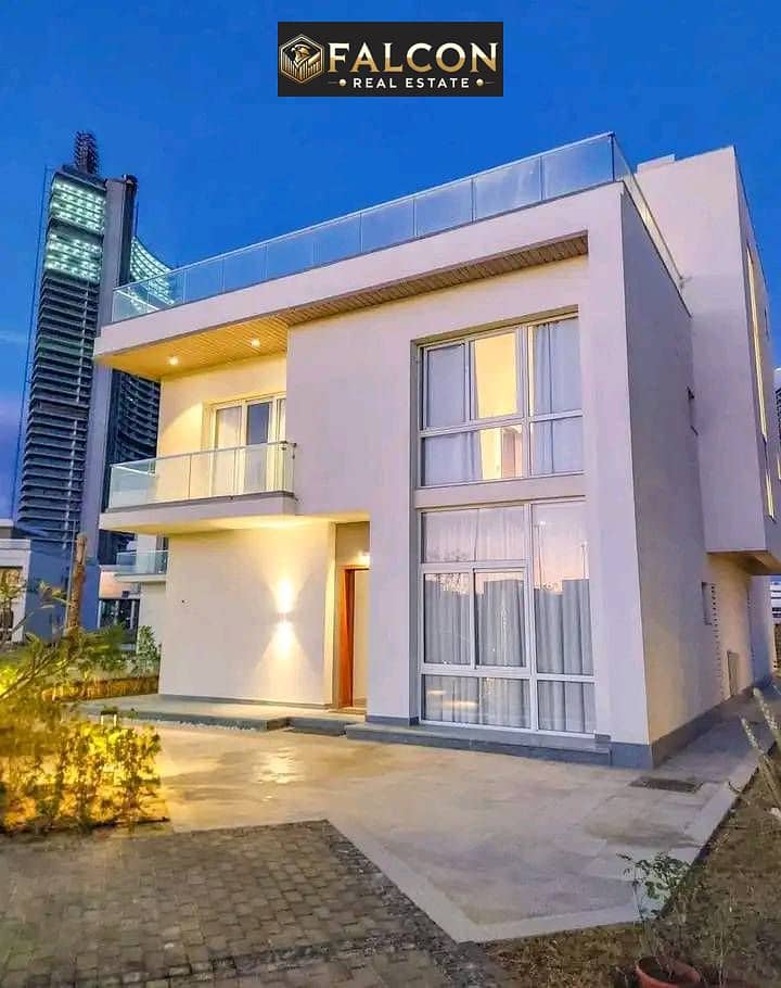 get now Villa for sale fully finished, located in front of the Alamein Towers! Featuring a direct sea view with VIP standards. A guaranteed investment - Fler