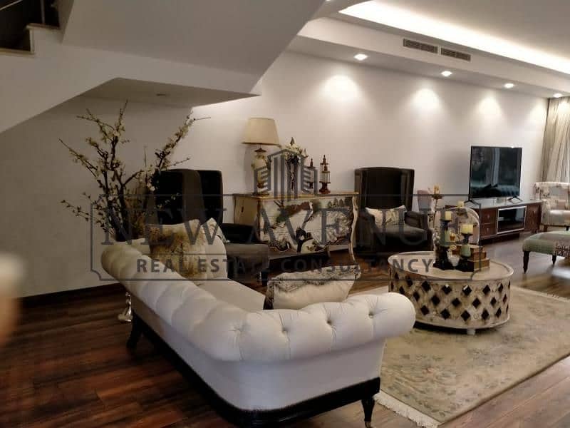 Twin House for sale at Les Rios New Cairo Prime Location High End Finishing ACs in All Bedrooms Solar Water Heater Ready to Move 3m Water Tank - Fler
