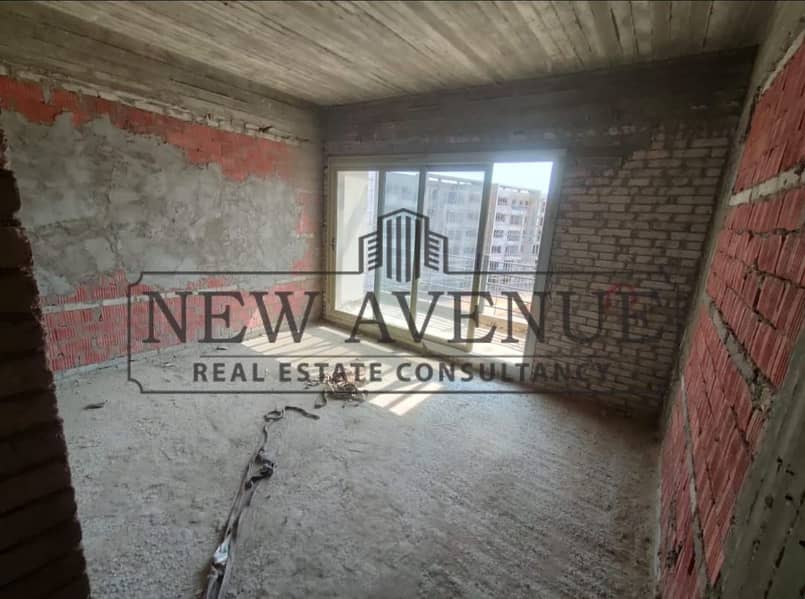 Two-bedroom apartment with an open view overlooking a stunning landscape, developed by Palm Hills - Więcej