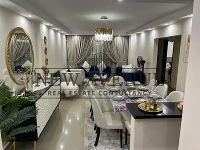 Delivered Fully Finished Apartment with parking slot in a very Prime Location for sale in Light City New Cairo