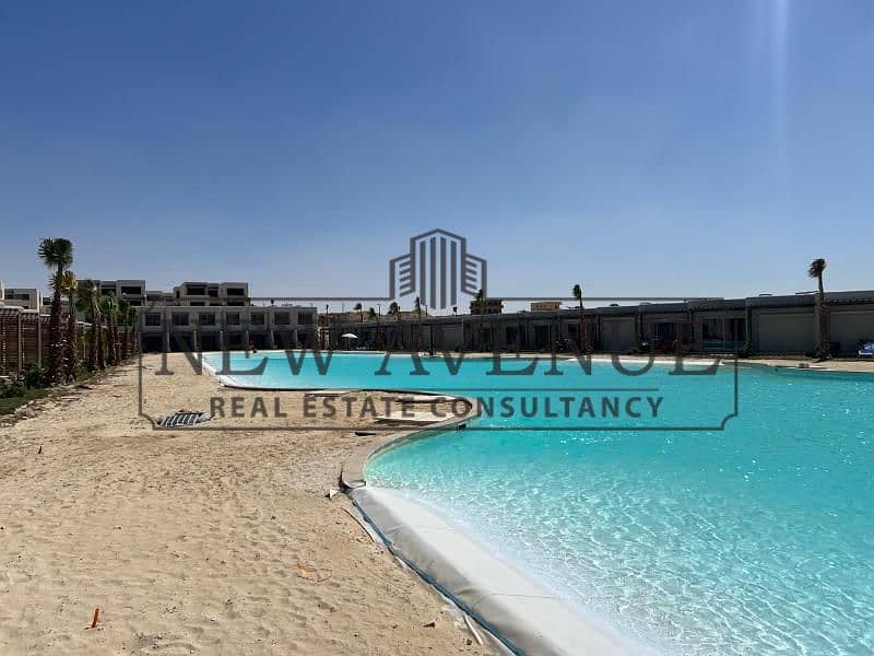 Chalet for sale on greenery and pool in Hacienda West Almond Fully finished Delivery date 9/2026 bua 114m - Aanzicht 3