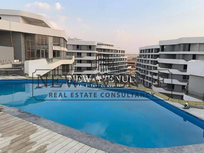 ground apartment with garden installments 2 bedroom in bloom fields phase lake side by tatweer misr in al mostakbal city - Widok 3