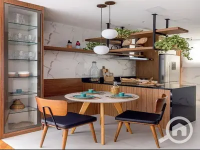 A fully finished studio apartment with air conditioning, plus free garage and club access, is for sale near the Diplomatic Quarter with a down payment