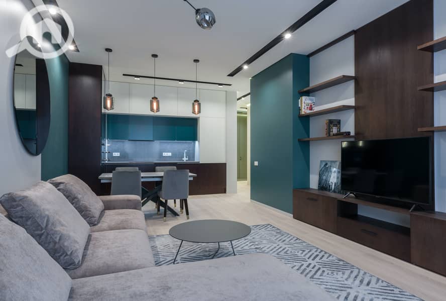 With a 6% down payment, seize the opportunity for a stunning one-bedroom apartment with an open view for sale in the most prestigious compound in Al Tagamoa. - Bild 2