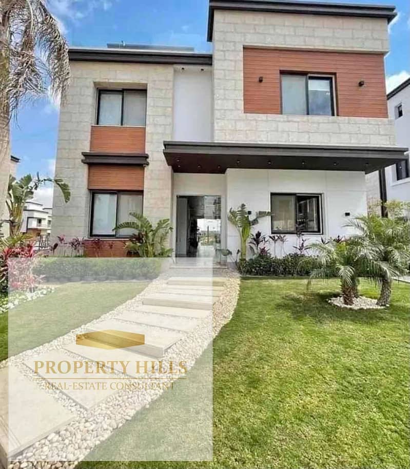 Last corner villa at the lowest price with installment plans in Azar, with parking, a compound of villas only, landscape view in the New Cairo area next to Mivida and the American University on 90th Street. - Ansicht 2