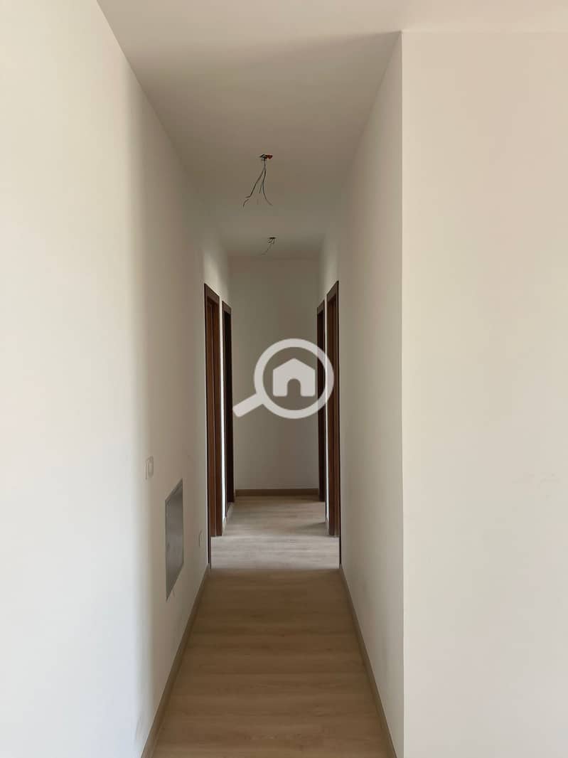 A distinctive 125-square-meter ground-floor apartment with 3 bedrooms and a garden is available for rent in Kayan Badr El Din Compound - Mehr
