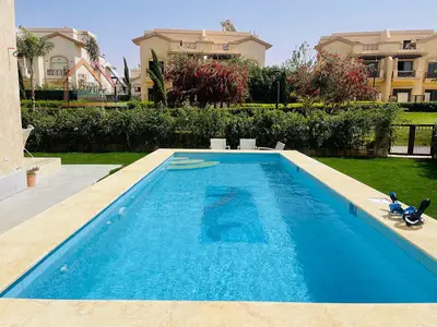 Villa for sale, Standard Alwan in Madinaty, Model C3, wide garden view with swimming pool, special finishes, Group 23, Villas VG3.
