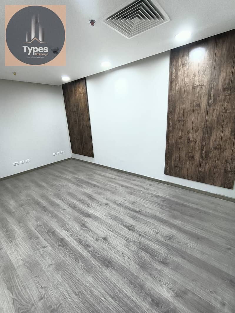 Office space for rent in Tarifium Mall, Sheikh Zayed, facing Americana Plaza and Capital Mall. The space is 88 square meters and includes two rooms - Ansicht 2