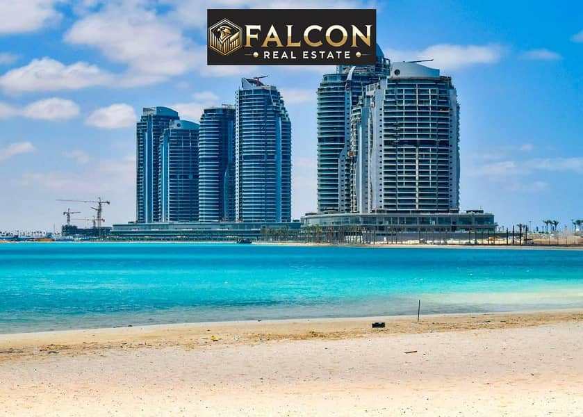 Down 150,000 +In front of the towers, an apartment for sale in New Alamein, North Coast, triple view of the lagoon and Alamein Towers - Više