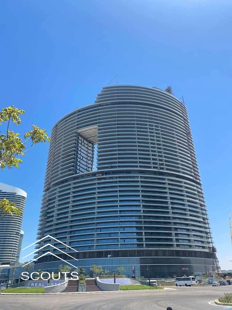Fully finished apartment for sale, ready for viewing, with a direct sea view in the new Alalamein Towers on the North Coast. - Więcej