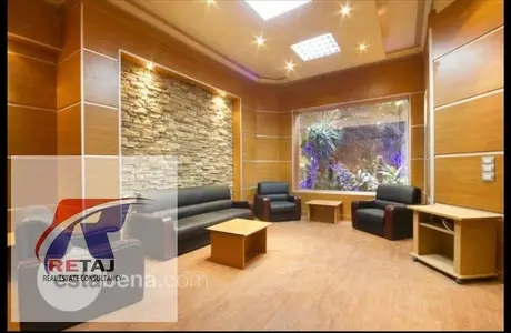 Furnished administrative office for rent opposite Cairo Festival City. Prime location with private entrance.