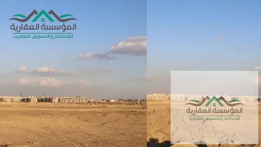 For sale in Beit Al-Watan - West of Cairo University - Plot letter A - Area 550 meters - Sea-facing double front on a green area and 3 numbers from th