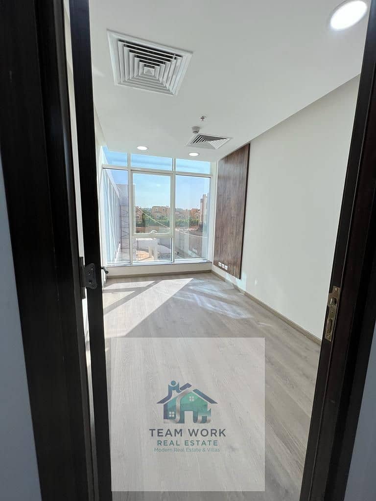 Office for rent opposite Capital Business Park and Park Street, fully finished with air conditioning, prime location in the heart of Sheikh Zayed City - Mehr