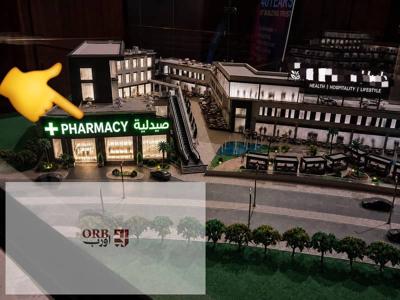 98 sqm pharmacy in Banking Complex facing Downtown 1st Settlement , mega project in top traffic area . DP from 3.9M EGP , installments over 8 years . - Vista 2
