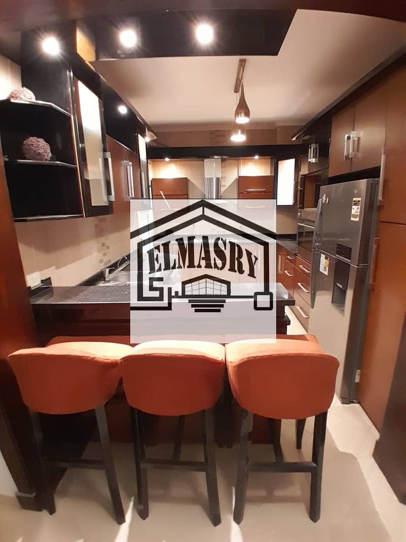 Furnished apartment for rent on the ground floor with a garden in the Akasia compound in front of Gate 6, Al-Rehab, with an area of 211 square meters and a garden of 268 square meters, in the prime location of the First Settlement, New Cairo. - Bild 3