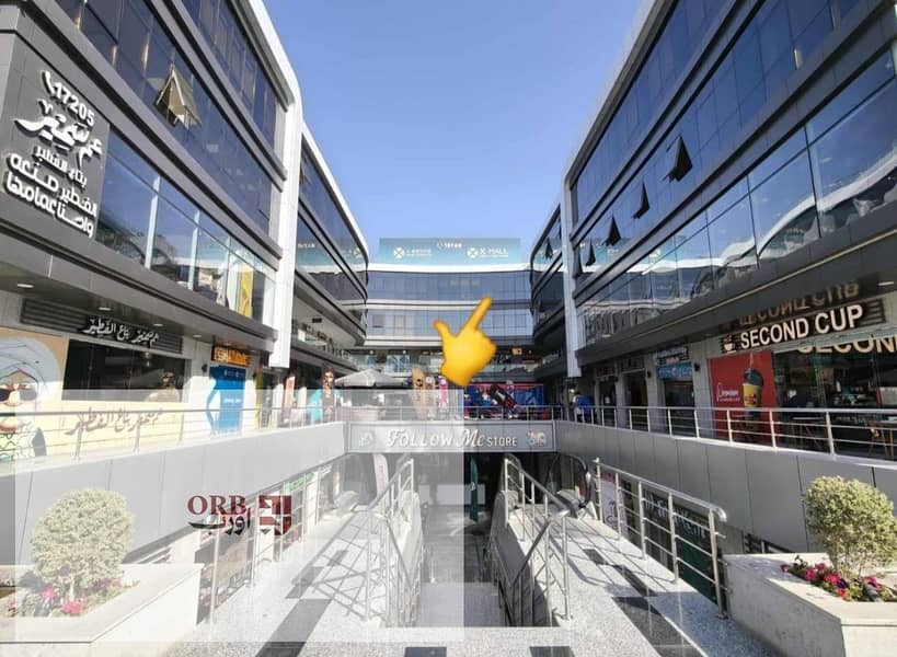 59 sqm office ready now in New Cairo, rented for 63K monthly at a running mall in Banafseg, 1 mins from Mohamed Naguib & North 90 St. Prime area!!!. . - Widok 3