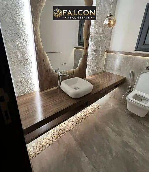 Down payment 550,000 fully finished corner apartment for sale with 10 years installments in City Gate next to Mivida Hyde Park and AUC - Mehr