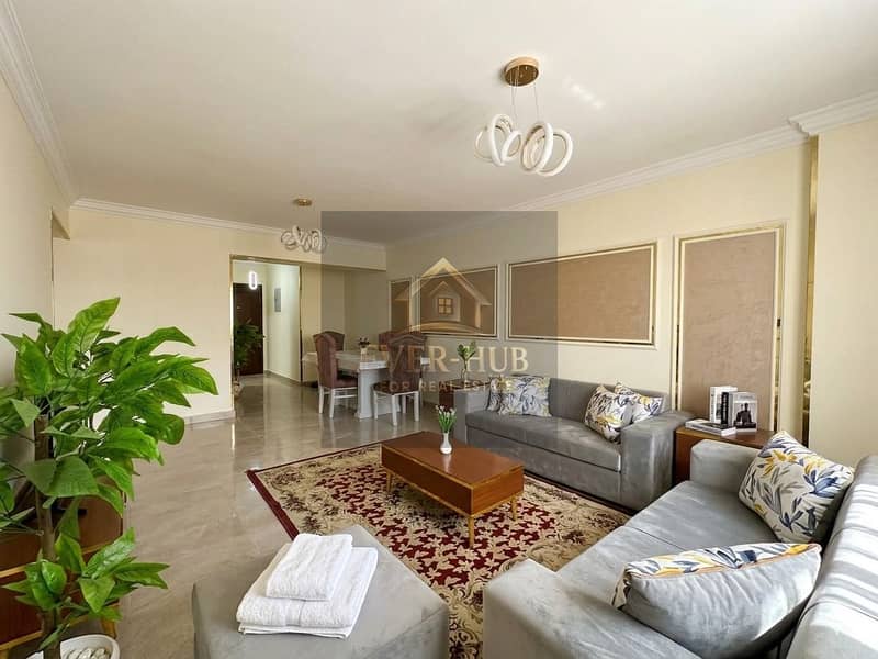 Furnished modern apartment for rent, largest area in the compound, 3 bedrooms + 3 bathrooms, ground floor, open view, near Alia Compound, Jannat Zayed - Aanzicht 2