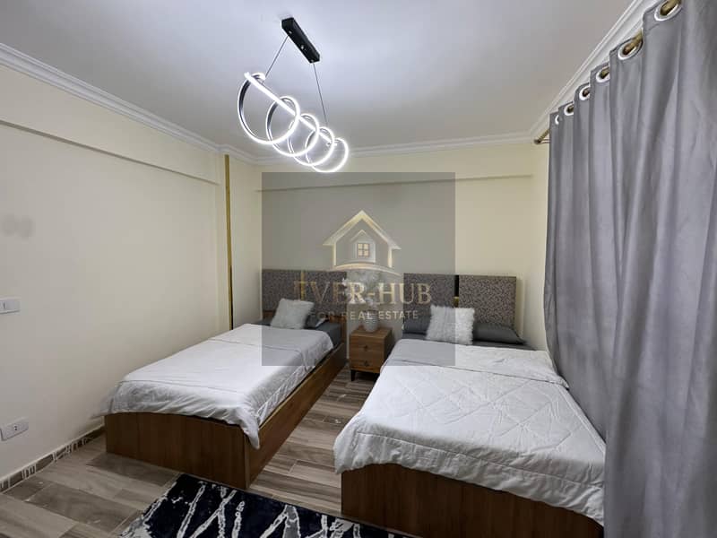 Furnished modern apartment for rent, largest area in the compound, 3 bedrooms + 3 bathrooms, ground floor, open view, near Alia Compound, Jannat Zayed - Aanzicht 5