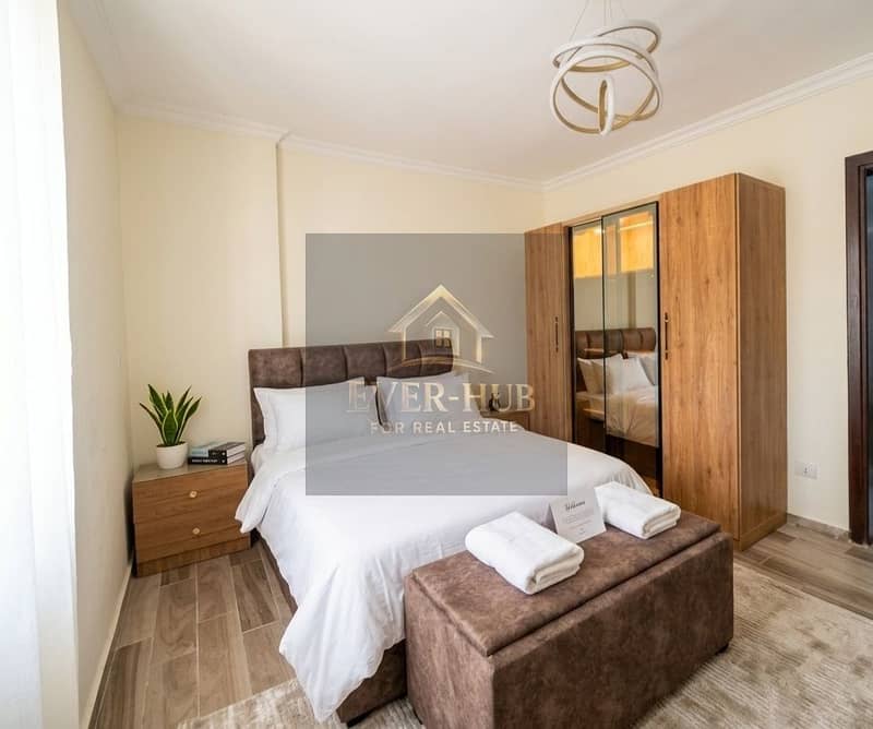 Furnished modern apartment for rent, largest area in the compound, 3 bedrooms + 3 bathrooms, ground floor, open view, near Alia Compound, Jannat Zayed - Aanzicht 6